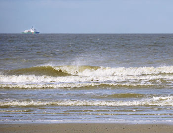 Scenic view of sea against clear sky