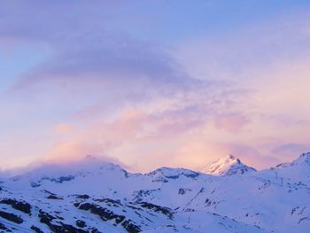 Scenic view of snow covered mountains