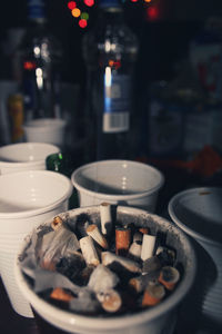 Close-up of candles on table