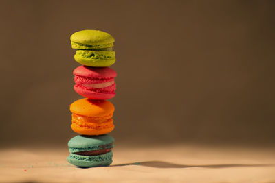 Close-up of multi colored candies on table