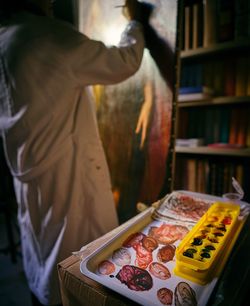 Midsection of man preparing food