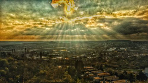 Scenic view of landscape against cloudy sky