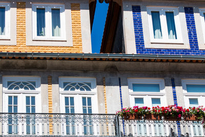 Low angle view of building against blue sky