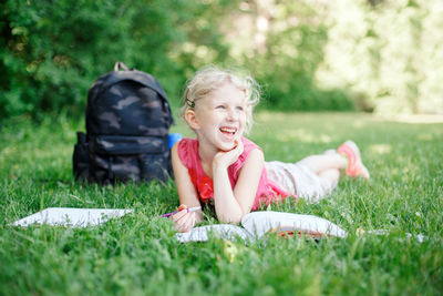 Girl sitting on grass