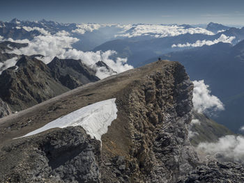 Scenic view of snow mountains against sky