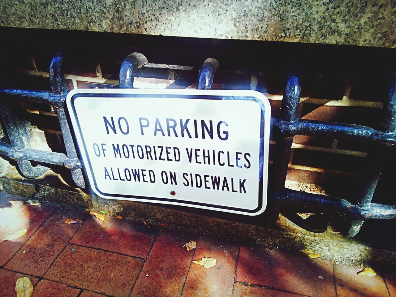 CLOSE-UP OF TEXT ON FOOTPATH