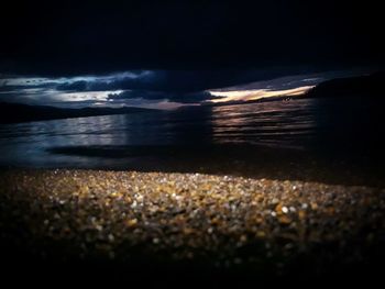 Scenic view of sea against sky at sunset