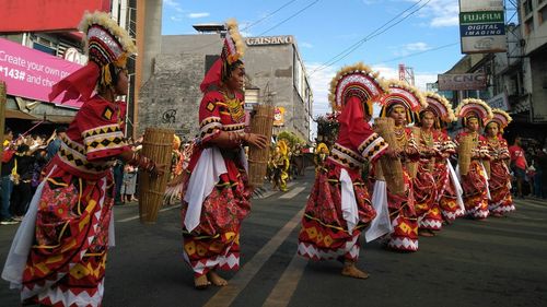 Panoramic shot of people on street