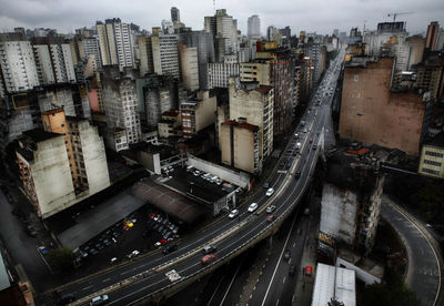 High angle view of street amidst buildings in city