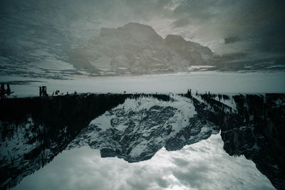 Scenic view of snowcapped mountain against sky