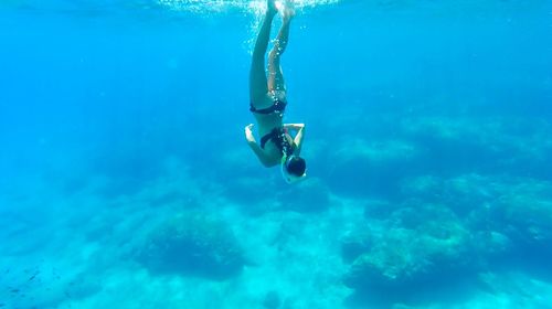 Man swimming in sea