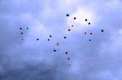 Low angle view of balloons in sky