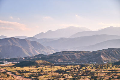 Scenic view of mountains against sky during sunset