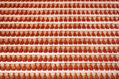 Sha tin, hong kong, china, asia - many little buddhas statues at the 10000 buddhas temple.