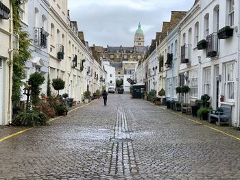 Street amidst buildings in city