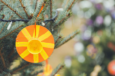 Handmade eco friendly decoration made of old cd or dvd discs on a christmas tree. diy ideas. recycle