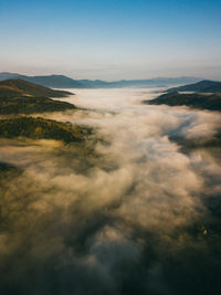 Fog in the mountains of the carpathians, view from the drone