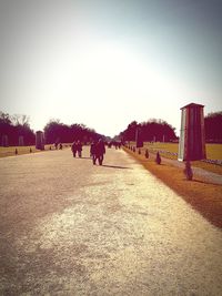 Panoramic view of people in park against clear sky