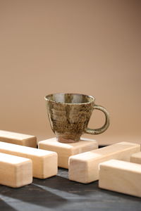 Close-up of coffee cup on table