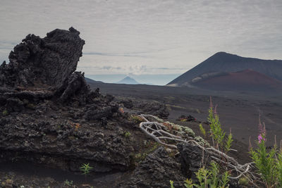 Scenic view of volcanic mountain against sky