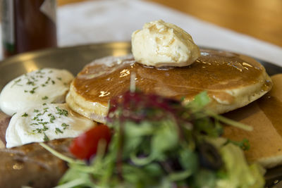 Close-up of food in plate on table