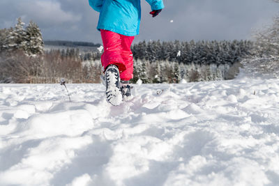 Low section of person in snow