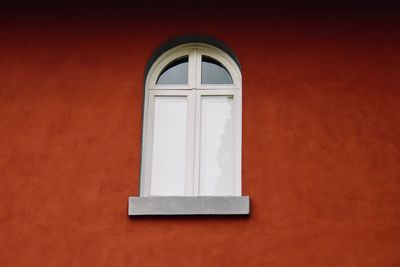 Close-up of window on wall of building