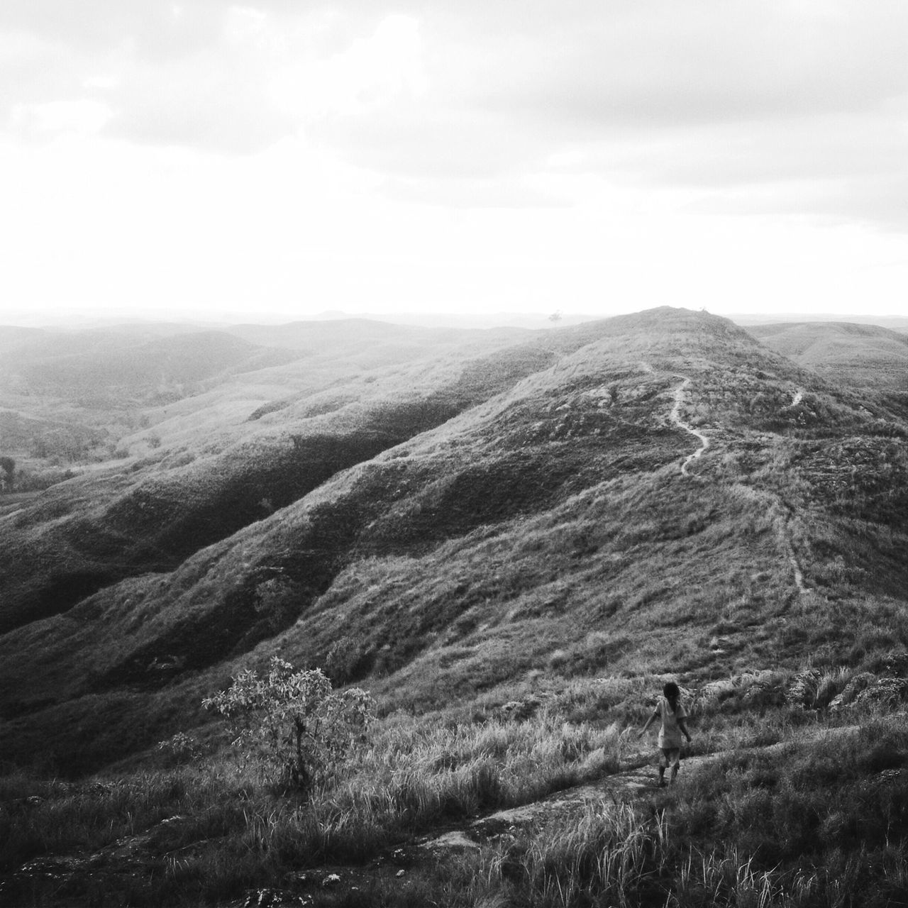 landscape, tranquil scene, tranquility, scenics, mountain, sky, beauty in nature, nature, non-urban scene, cloud - sky, grass, remote, idyllic, mountain range, hill, horizon over land, field, cloud, day