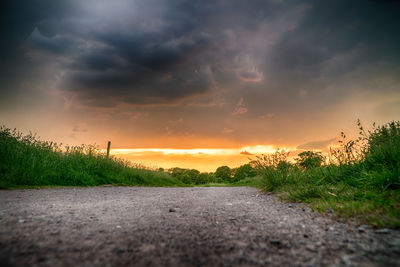 Road against sky during sunset