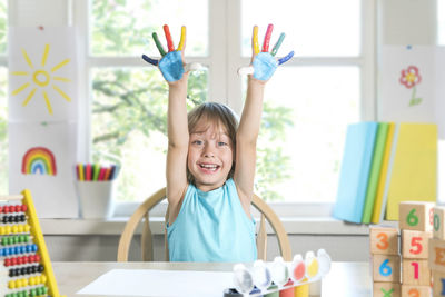 Portrait of smiling boy at home