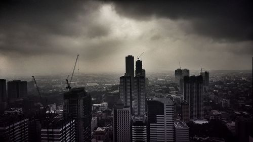 Modern buildings in city against sky