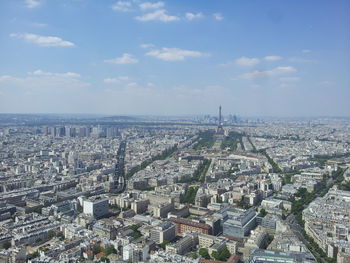 High angle view of city buildings against sky