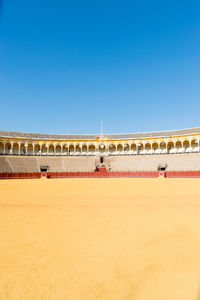 View of historical building against clear blue sky