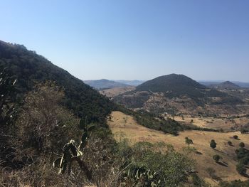 Scenic view of mountains against clear sky