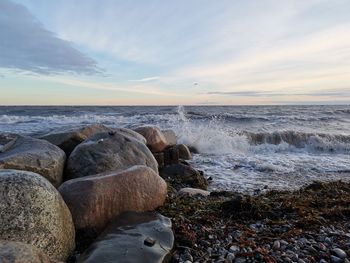 Scenic view of sea against sky during sunset