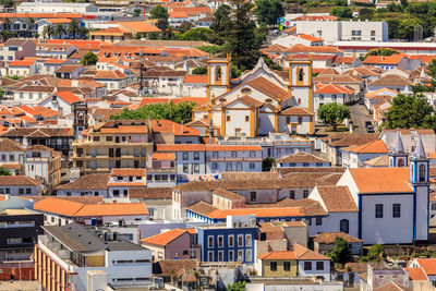 High angle view of residential buildings in city