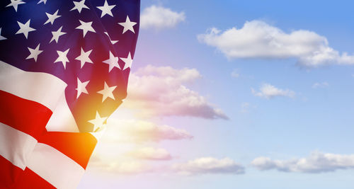 Low angle view of flag against sky