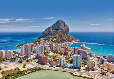 High angle view of sea and buildings against sky