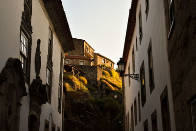 Low angle view of buildings against clear sky
