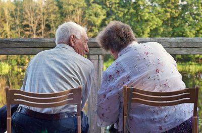 Rear view of couple walking outdoors