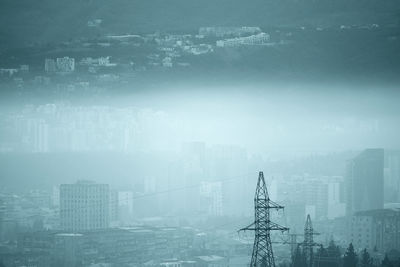 Aerial view of buildings in city during winter