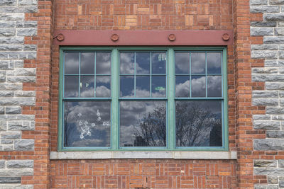 Broken glass window of building