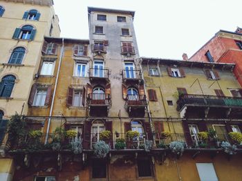 Low angle view of residential building against sky