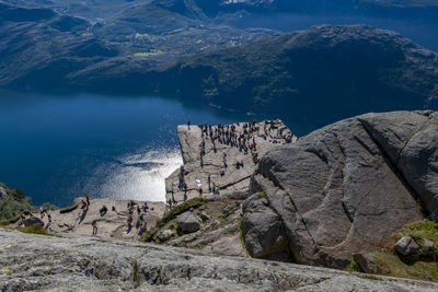 Preikestolen, tourist attraction in norway. steep cliff which rises 604 metres  - 1982 feet high