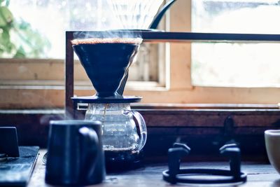 Close-up of coffee served on table