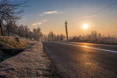 Surface level of road at sunset