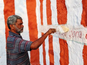 Painting temple wall