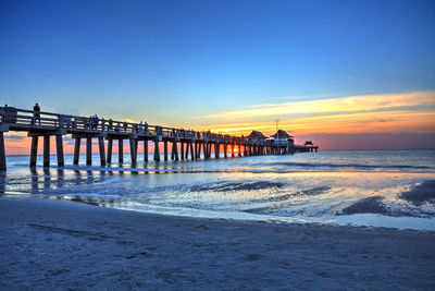 View of beach at sunset