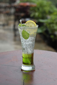 Close-up of drink on glass table