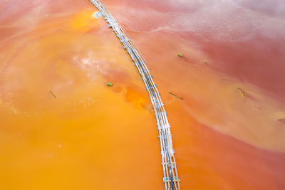 High angle view of orange crane